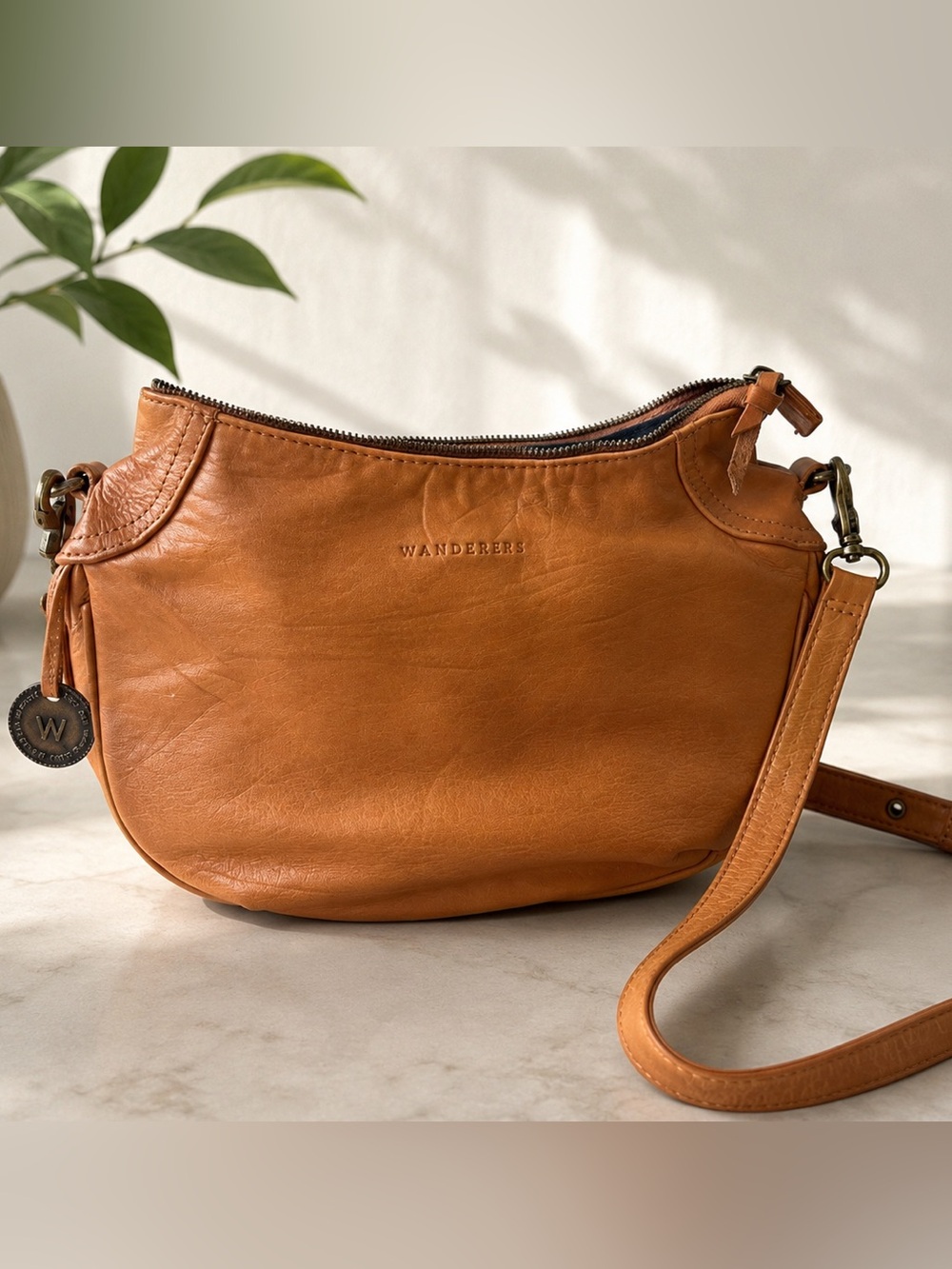 Wanderers Travel Co Tan Santorini Leather Crescent Crossbody